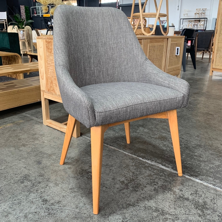 grey fabric chair wooden legs